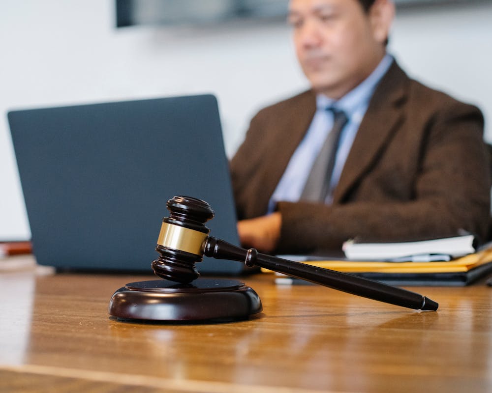 Lawyer reviewing documents with a client