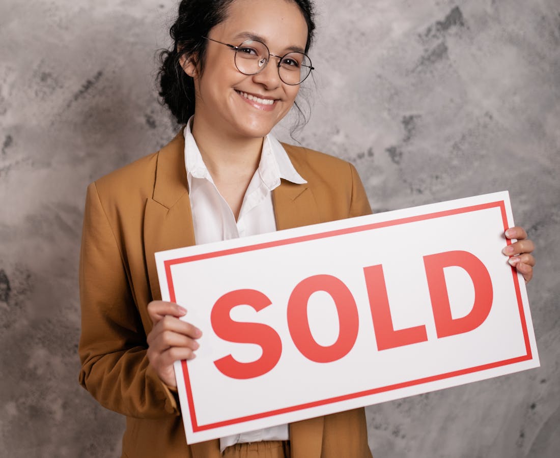 Real estate agent handing over keys