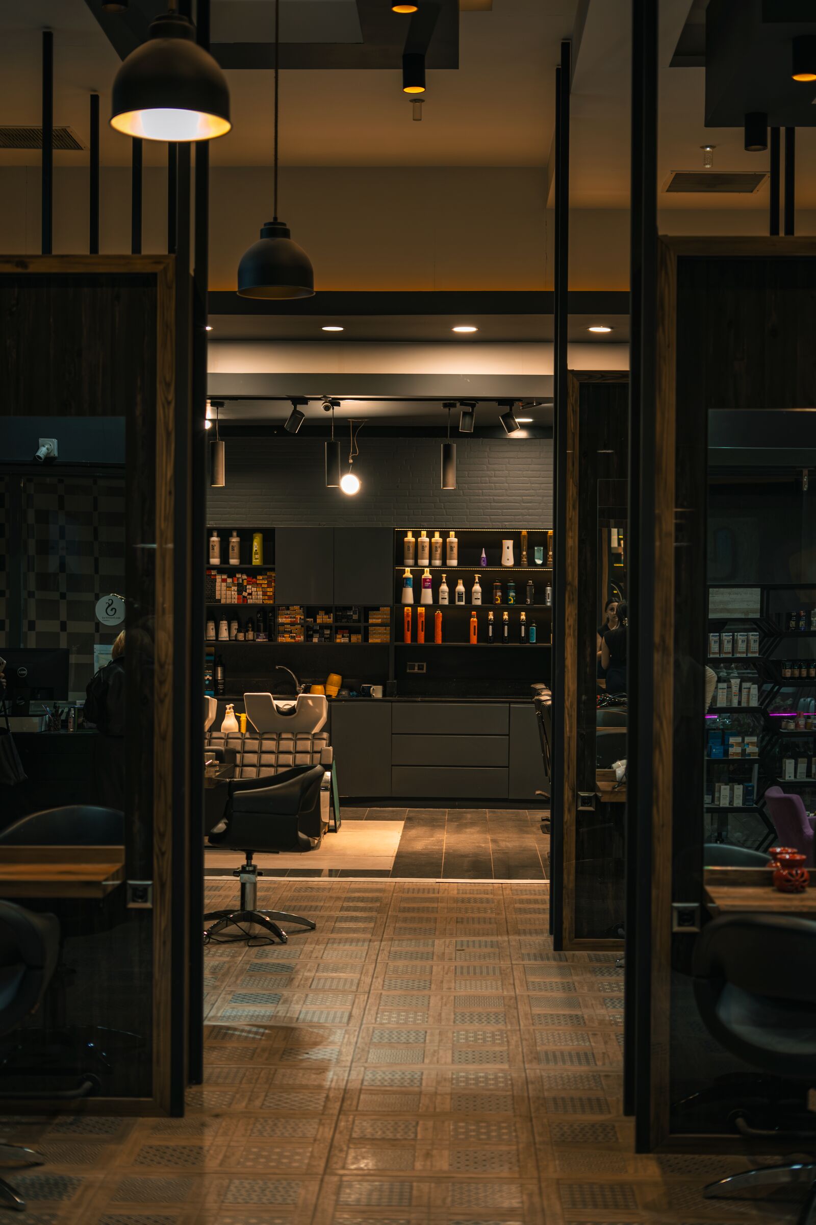 Modern hair salon interior with stylish lighting and styling stations
