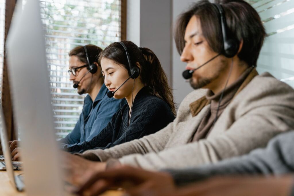 Team of call center agents providing round-the-clock coverage